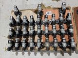 a lot of different types of valves on a pallet