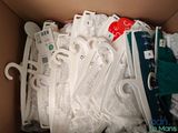 a box full of clothes and a pair of scissors in it