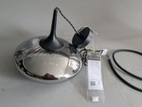 a lamp that is sitting on a table next to a cord