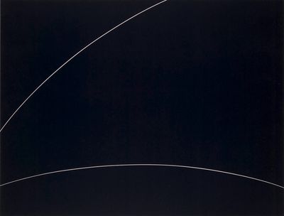 a black and white photo of a plane flying through the sky
