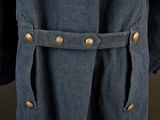 a close up of a military coat with buttons on it