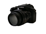 a picture of a camera with a lens attached to it