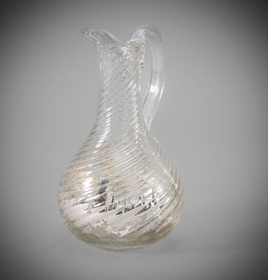 a glass vase that is sitting on a table
