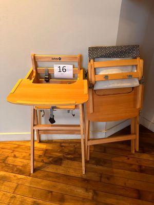 a small table with a chair and a laptop on it