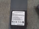 a close up of a small device on the ground