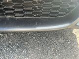 a close up view of a car ' s grille and front bumper