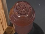 a bottle of wine that is sitting on a table