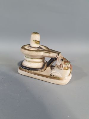 a figurine of a man on a motorbike