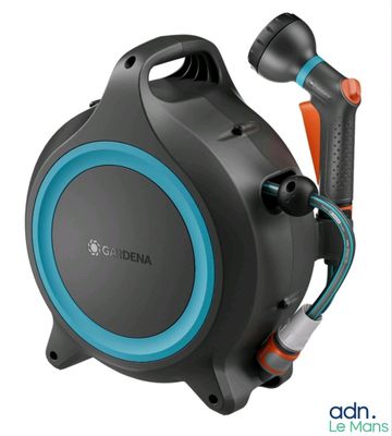 a close up of a black and blue speaker with a hose