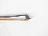 a toothbrush and a toothbrush on a white surface
