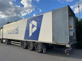 a large semi truck that is parked in a parking lot