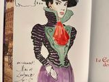 a drawing of a woman in a hat and dress