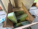 a box full of soaps sitting on the floor