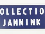 a blue and white street sign that says collection jamin ink