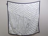 an image of a wall hanging with a black and white pattern