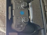 a box with a game controller inside of it