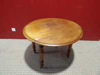 Table ovale en bois naturel à 2 volets. (photo 4)