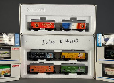 a box with a train set in it and a box with a train set in it