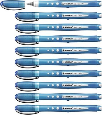 six stylos bleus sont empilés les uns sur les autres