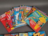 a lot of children ' s comic books on the table