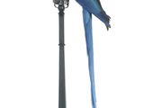 a blue and orange parrot sitting on top of a pole