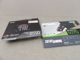 two boxes of gaming equipment sitting on top of a table