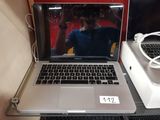 a laptop computer that is sitting on a table