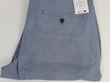 a picture of a pair of blue pants with a tag on it