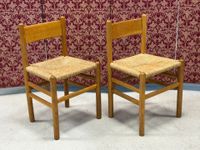 Paire de chaises paillées dans le style de Charlotte Perrian…
