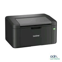 a black printer sitting on top of a white surface