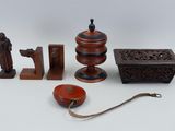 a small collection of asian items on a white surface
