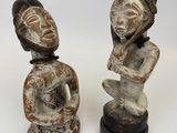 pair of african figurines of a man and a woman