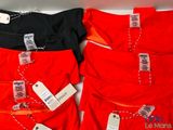 three pairs of red, black, and white shirts with price tags on them