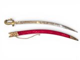 two swords, one with a gold handle and the other with a red handle