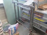 a picture of a machine that is sitting in a garage