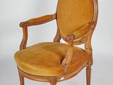 an image of a chair with a yellow upholstered upholstered seat