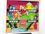 a picture of a pinball game with a lot of people on it