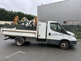 a white truck that is parked in a parking lot