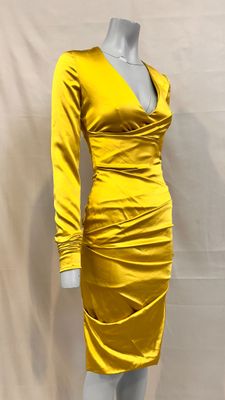 a yellow dress on a mannequin mannequin mannequin mannequin mannequin mannequin mannequin mannequin mannequin