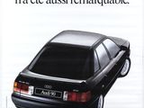 an advertisement for a car that is parked on the side of the road