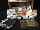 a lot of books and games on the table