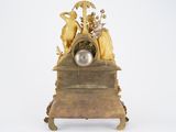 a clock that is sitting on top of a table