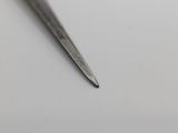 a pair of scissors that are on a table