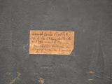 a piece of paper on the wall with writing on it