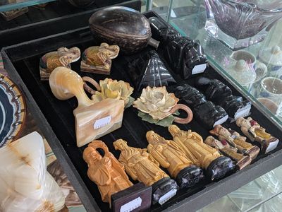 a display case filled with lots of different types of figurines
