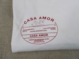 a white t - shirt with a red logo on it