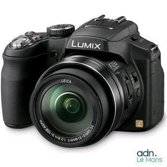 a black camera with a lens attached to it