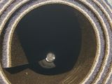 a close up of a roll of cloth on a table