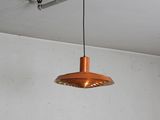 a light that is hanging from the ceiling in the room