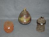 three different types of vases on the table